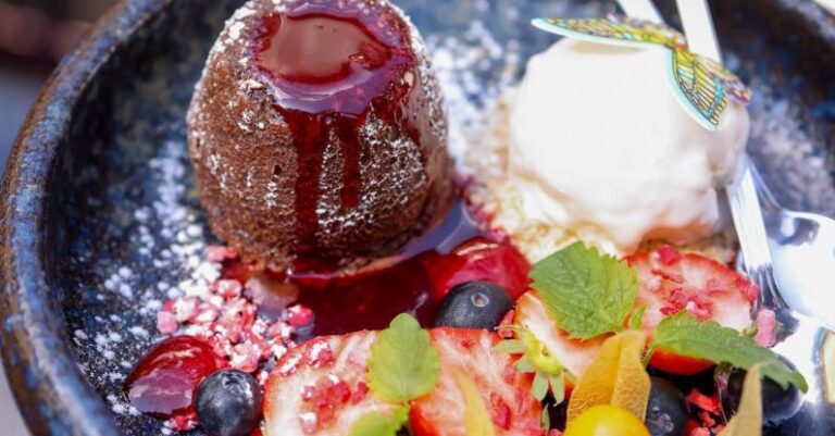 Presentation Trends - A dessert is served on a plate with a fork and spoon