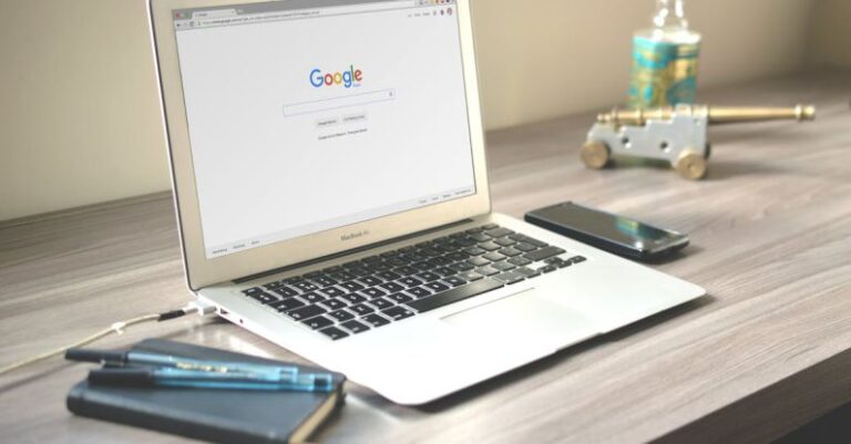 Brand Awareness - Macbook Air on Grey Wooden Table